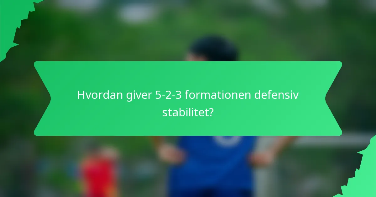 Hvordan giver 5-2-3 formationen defensiv stabilitet?